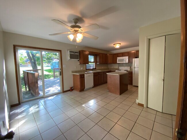 spacious kitchen with gorgeous back yard - 1518 Howell Rd