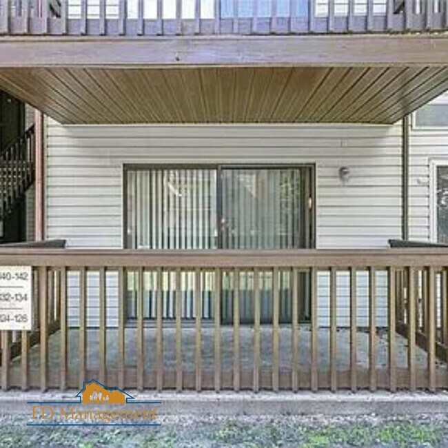 Building Photo - Modern First-Floor with Private Patio in Hampton Club