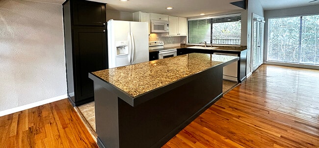 Kitchen island is perfect for a few stools - 6724 Eastridge Dr