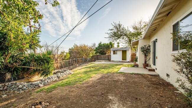 Building Photo - 4 Bedroom home with RV parking