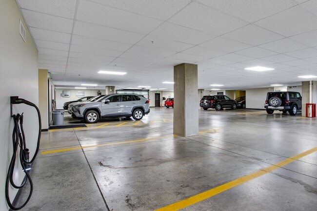 Building Photo - Lock-And-Leave Luxury Single-Level Condo with 2 Primary Suites & Private Parking