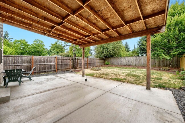 Building Photo - Custom-Built 4BR/2.5BA Two-Story Near Woodstock — Quartz Island Kitchen, Gas Fireplace & Fenced Y...