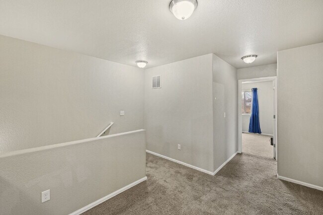 Building Photo - "Beautiful Townhome 3-Bedroom  2.5 Baths no carpet home, just 7 minutes from Fort Carson!"