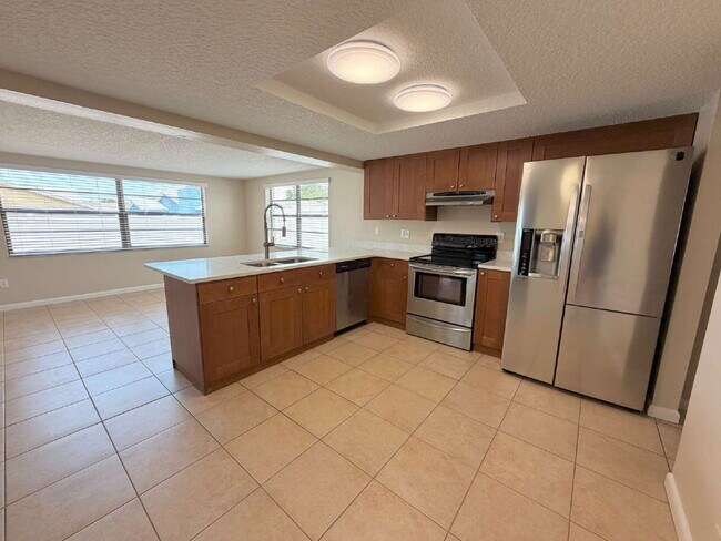 Building Photo - Spacious 2/2 with home with fenced yard in great Port Richey location.