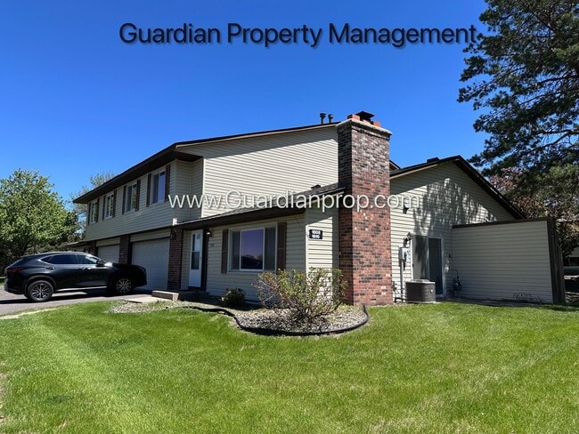 Building Photo - Renovated Burnsville Town Home, 2 Car Garage, W/D in Unit, Walk Out Patio, Dishwasher
