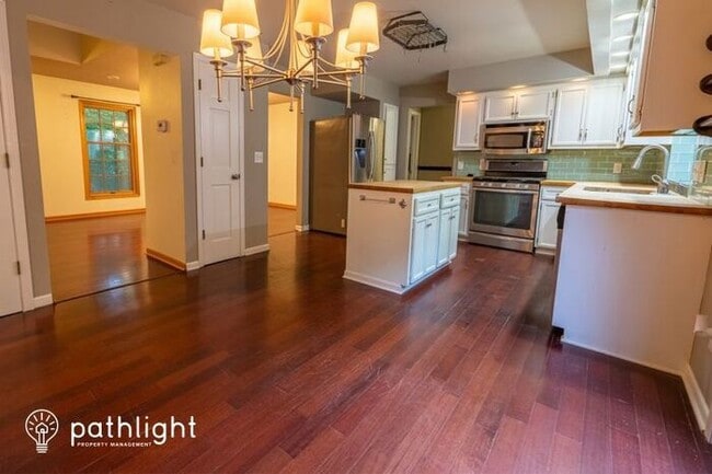 Building Photo - 5631 Whispering Pines Drive