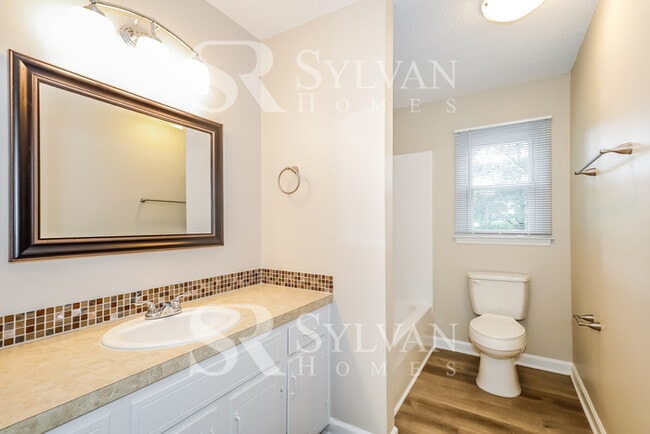 Building Photo - The living is easy in this 4 bedroom, 2 bathroom home