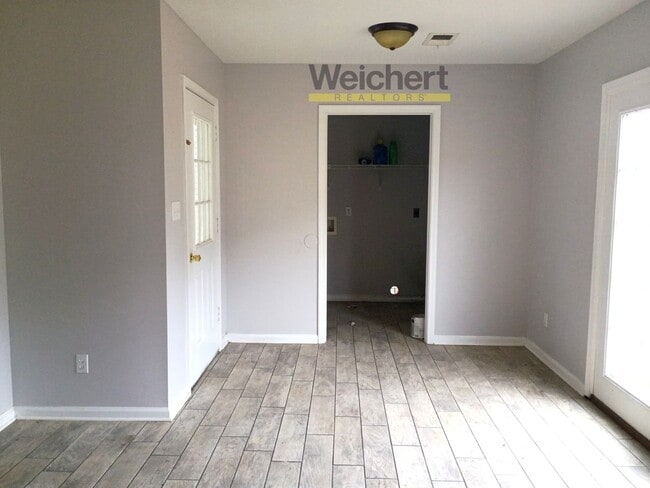 Building Photo - Spacious 3BR/2BA with Carport & Large Yard