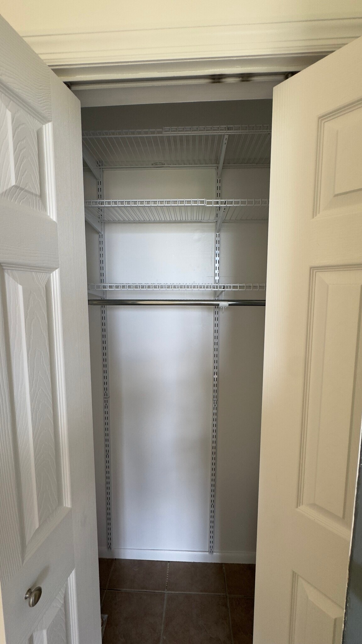 Coat closet organizer - 1714 Spruce Hills Dr