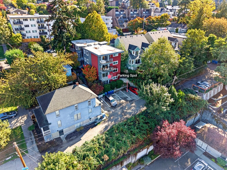 Outside view of building, deck and parking area - 3053 14th Ave W