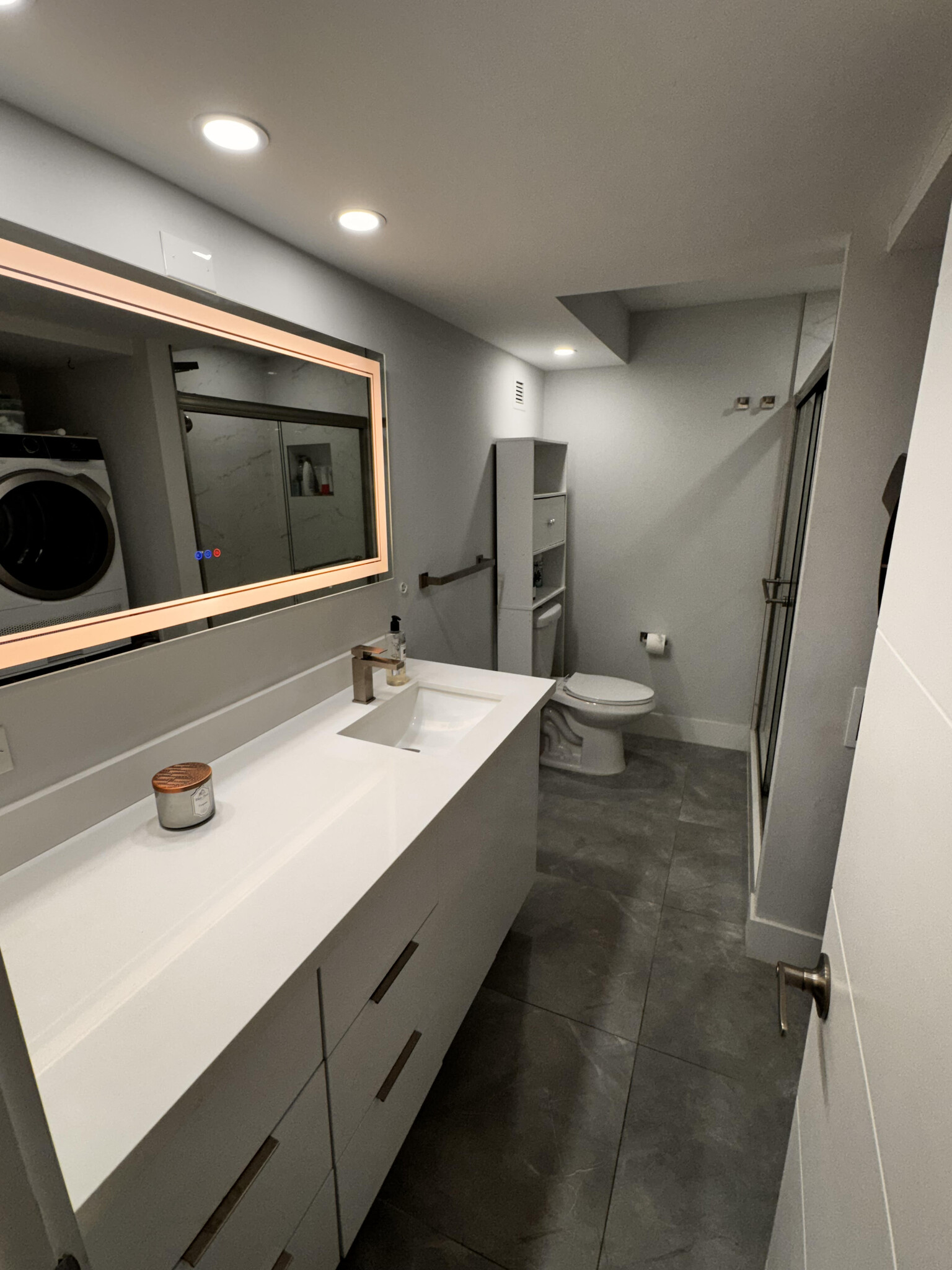 Master Bathroom with large heated and illuminated mirror that never fogs up! - 600 NE 36th St