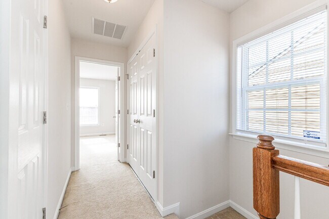 Building Photo - This beautiful townhouse has everything you need in a dream home.