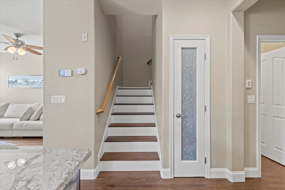 New Wooden Stairs with Pantry and Guest Half Bath - 807 Esplanade Cir