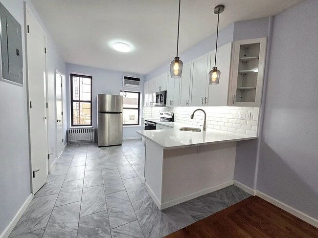 Building Photo - sunny, renovated, rent-stabilized one-bedroom apartment