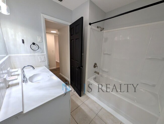 Building Photo - Just Reduced!!  POOL!! Beautiful 4/2/2 home with a POOL, 1700 Sq. Ft. with fenced yard, TONS of r...