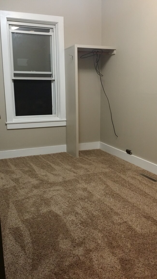 One of 2 guest bedrooms with new carpet and fresh paint. - 723 Chippewa Street