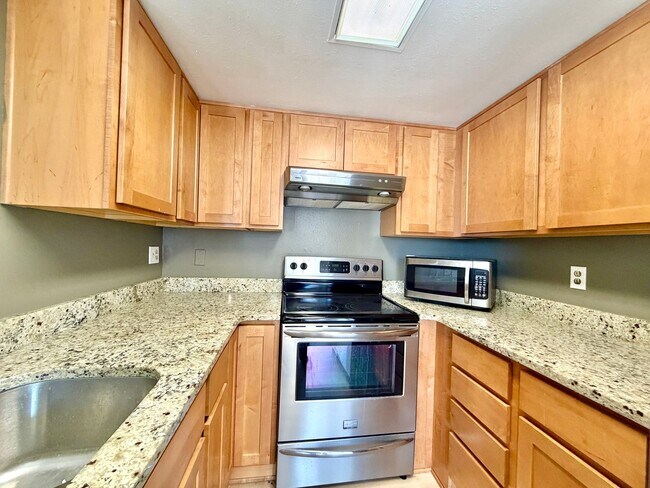 Building Photo - Peaceful Condo Retreat with Loft - Pet Friendly & Well Located