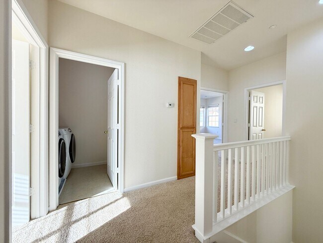 Building Photo - Renovated Coastal Home with NEW Kitchen and a Spacious Layout
