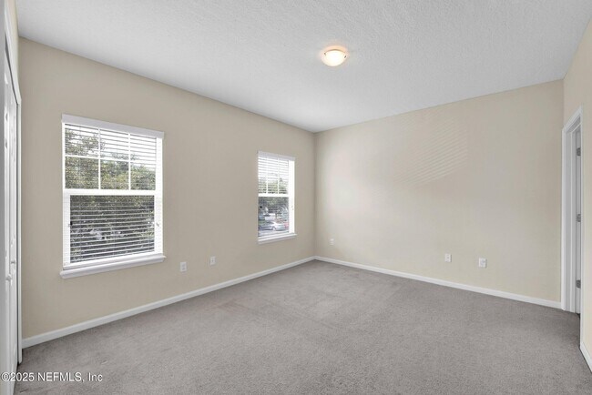 Building Photo - 8241 Pelican Landing Rd