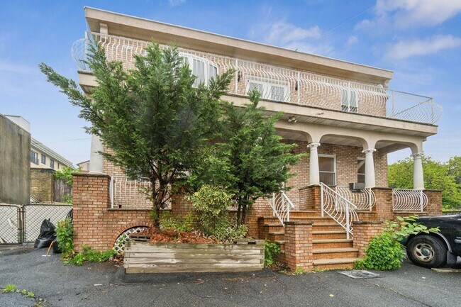 Building Photo - 310 Paterson Plank Rd