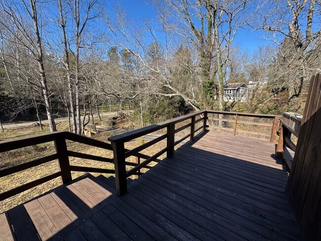 Building Photo - East AVL - Studio Apartment, Large Deck, Winter Views!