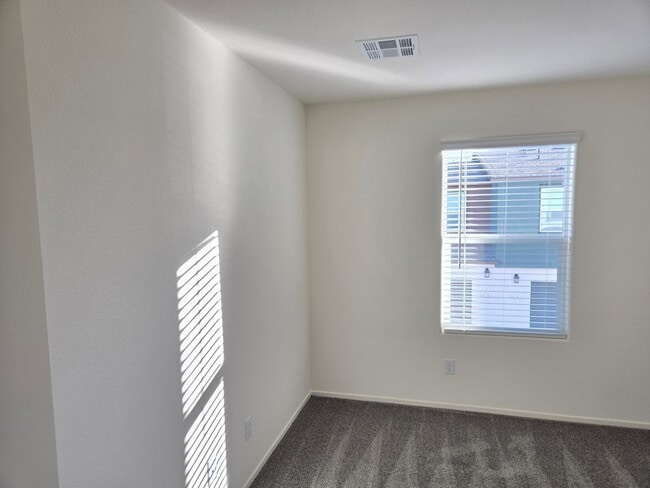 Building Photo - Kalea Trails Gated Cosmos Garden