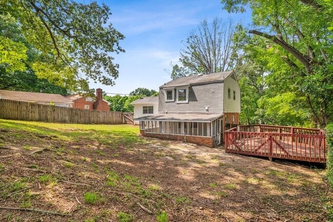 Building Photo - Large Home in Four Seasons Area, Hardwoods, Dining Room, Screed Porch, Fenced!