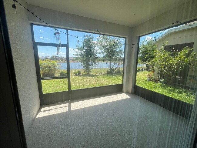 Building Photo - Resort-Style 55+ Living with Peaceful Water Views in Harmony