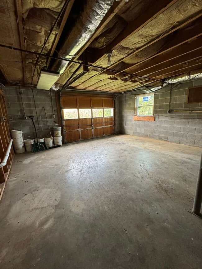 Building Photo - Exquisite Brick Ranch with Modern Upgrades, Countryside Charm And Two Car Garage