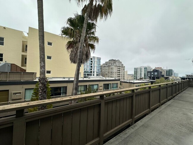 Building Photo - Modern 2BR/1.5BA Two-Level Condo w/ Patio ...