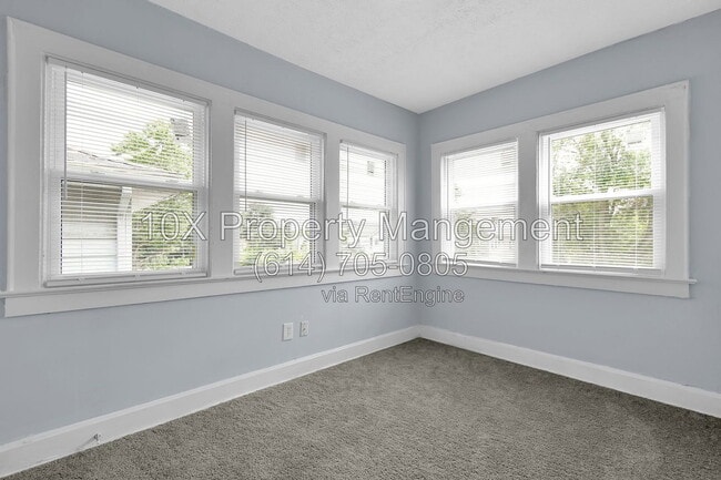 Building Photo - 1311 E 24th Ave