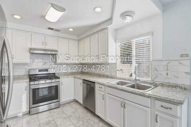 Building Photo - SE!!! 4 Bedrooms!! Master Downstairs!! No Carpet!! Synthetic Grass front and back!!