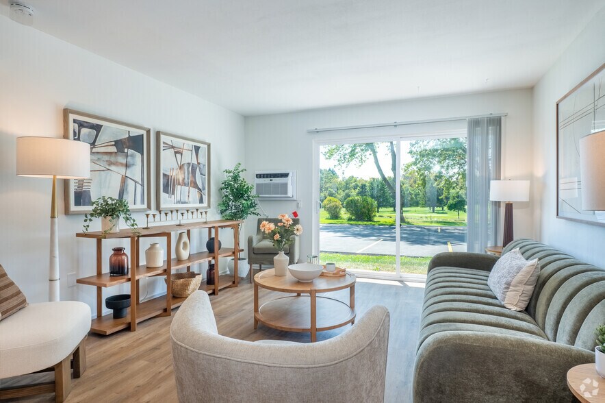 2BR, 1BA - 840SF - Living Room - ReNew at the Greens