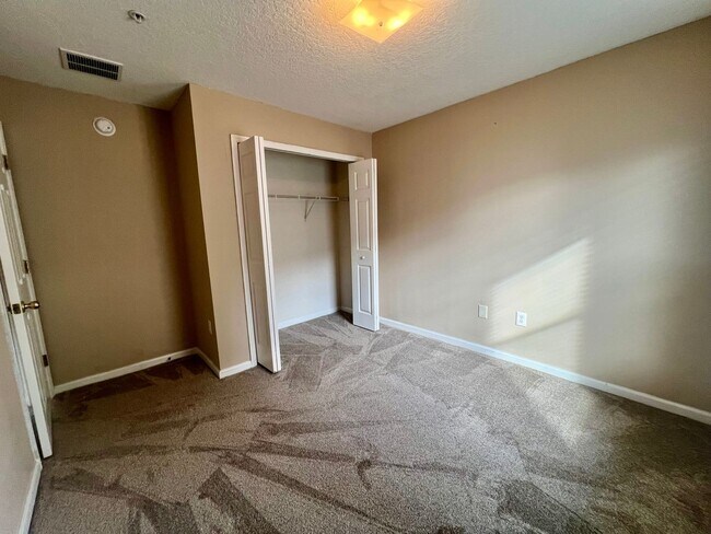 Building Photo - Gated Comfort Condo, Poolside Vibes: Your Next Home Awaits at Merrill Pines