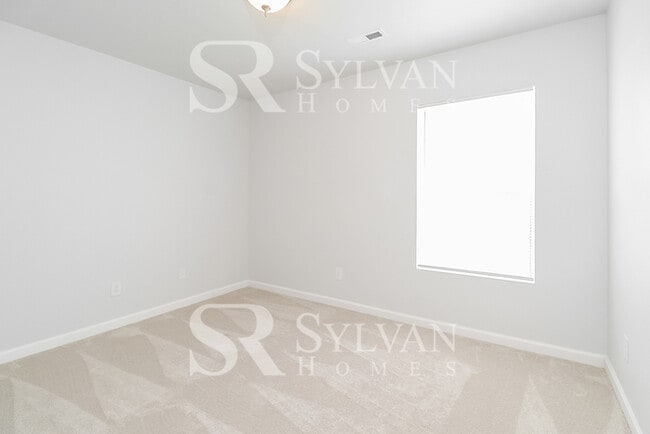 Building Photo - This adorable home is ready for your personal touch!