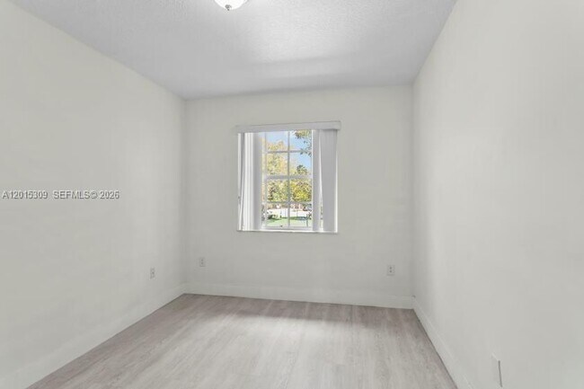 Building Photo - 5090 SW 136th Ave