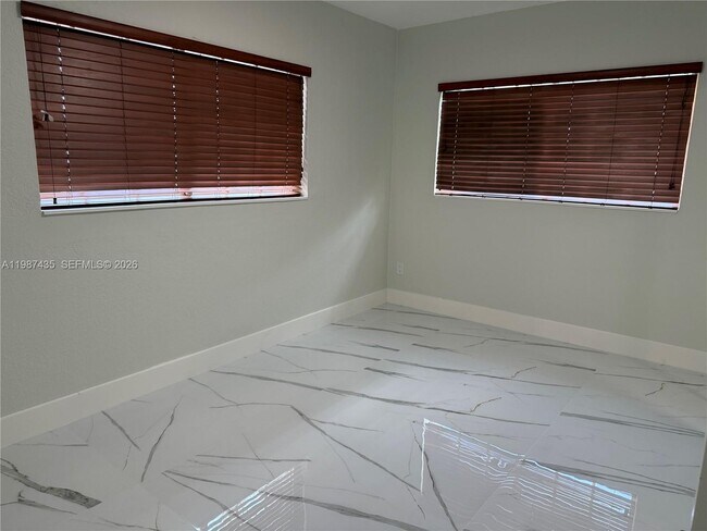 Building Photo - 11602 NW 58th Ave