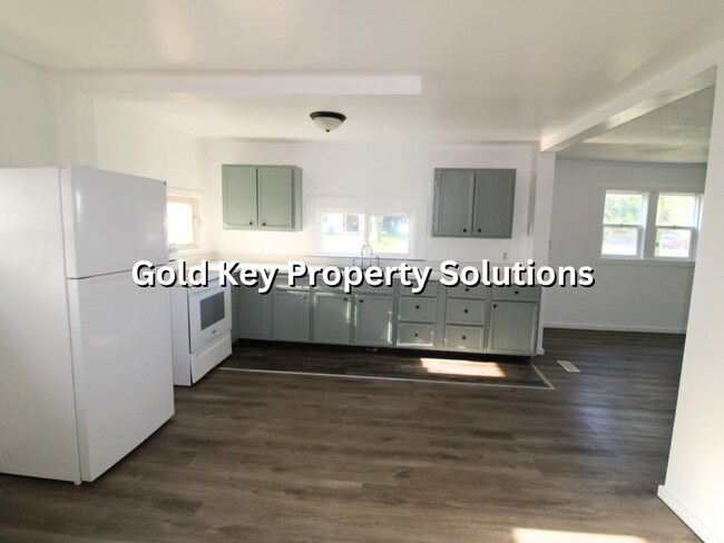 Building Photo - 2 BR 2 BA House with 2-Car Garage and Cent...