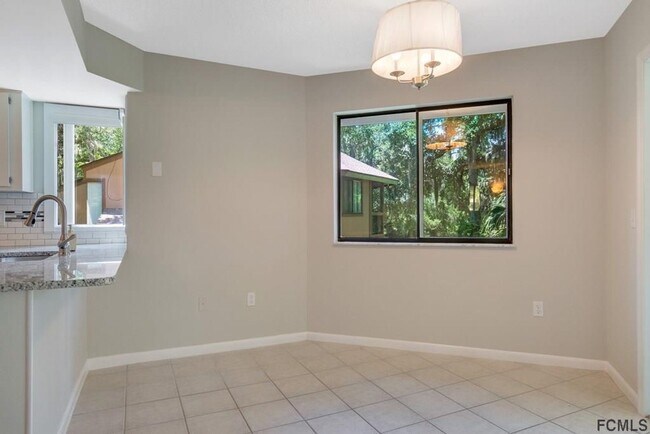 Building Photo - Stunning townhome on Palm Harbor Golf Course!