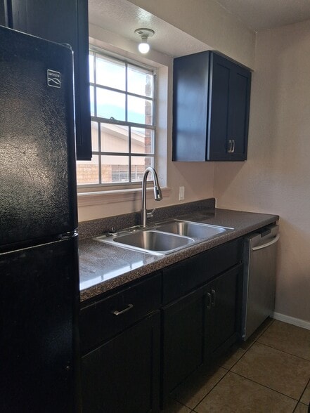 Building Photo - 6917 Alto Rey Ave Apt B