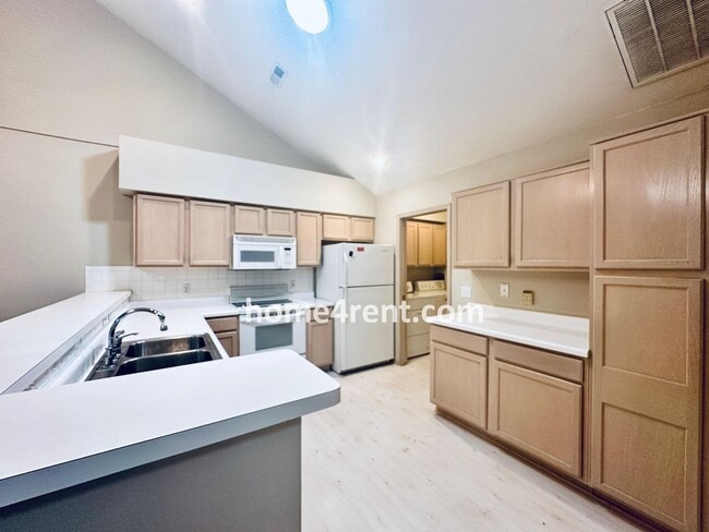 Building Photo - Maintenance FREE, Ranch Style Townhome w/ ...