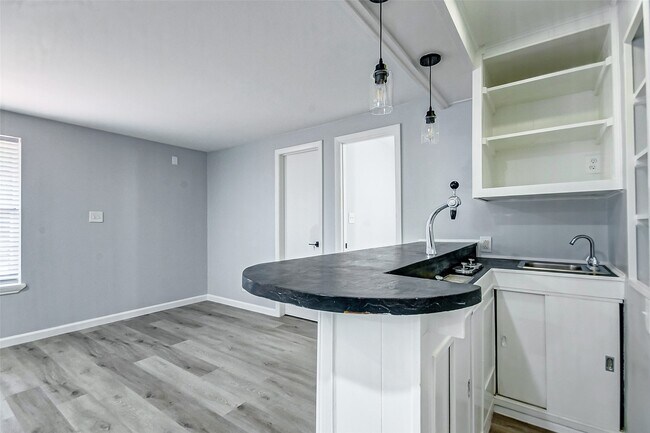 Building Photo - 5122 W Bellfort Ave