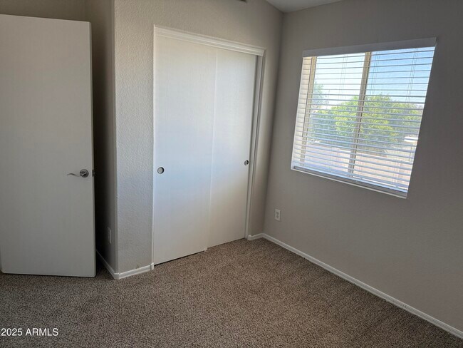 Building Photo - 8460 W Aster Dr