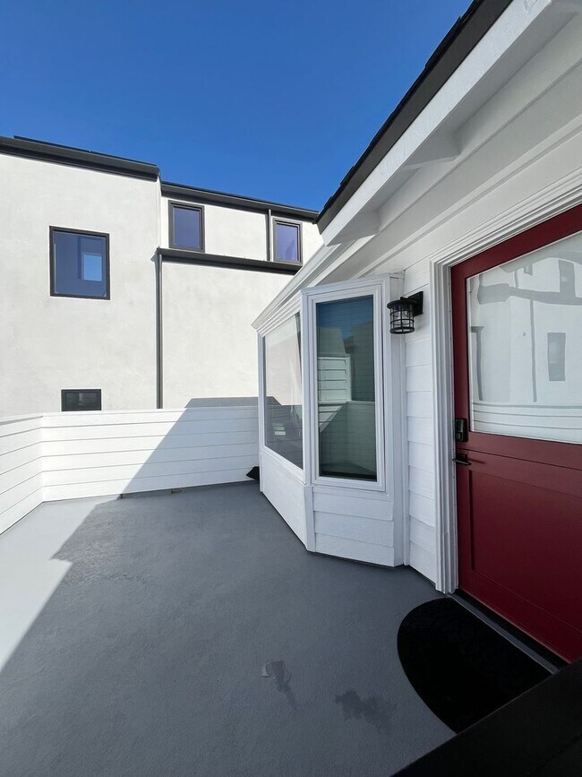 Building Photo - Location, Location, Location! Amazing upper unit near beach!