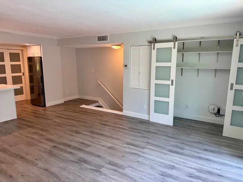 Open living area with built-in storage - 105 4th Ave NE