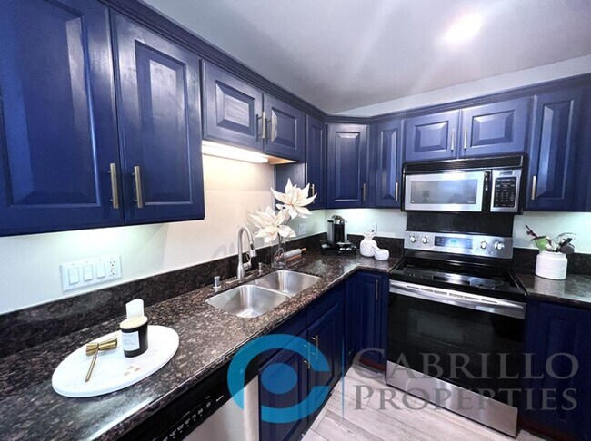 Building Photo - *** $500 OFF MOVE IN SPECIAL!!! *** Beautifully Renovated 2BD/2BA Condo with In-Unit Washer and D...