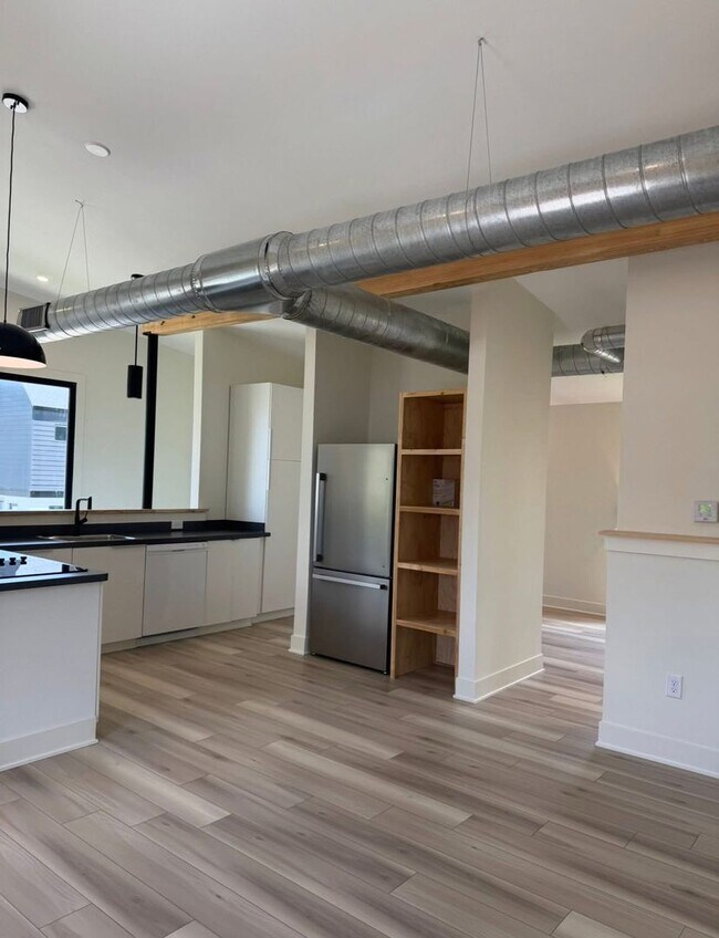 Building Photo - Vaulted Ceilings & Hardwood Floors in This Charming Indianapolis L