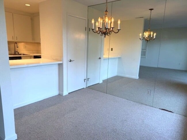 Building Photo - Newly Updated Condo with In-Unit Laundry and View