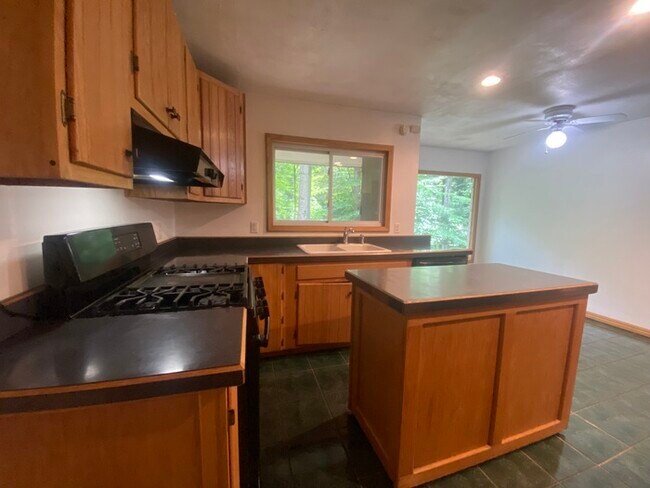 Building Photo - Secluded 4 bedrooms 3 baths with 2 car garage and fenced in yard in the town of Rutland for rent!