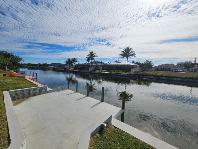 Building Photo - Waterfront Pool Home AVAILABLE NOW!